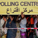 Southern Sudan voters wait in line to vote.